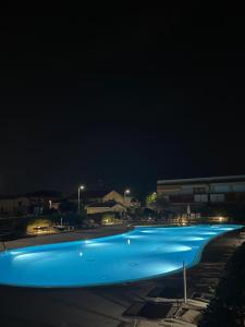 Bazén v ubytování Casa Belvì - Garden Appartement Lugana Sirmione nebo v jeho okolí