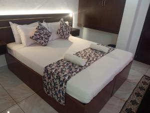 Hotel Samudra Tara客房内的一张或多张床位