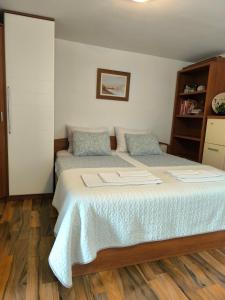 Posteľ alebo postele v izbe v ubytovaní BonBon condominium