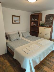 Posteľ alebo postele v izbe v ubytovaní BonBon condominium + 7 fotografií
