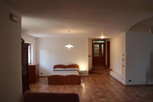 A bed or beds in a room at La Casa de Anto'