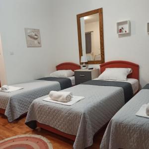 Postel nebo postele na pokoji v ubytování Apartman Tristan