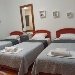 Postel nebo postele na pokoji v ubytování Apartman Tristan