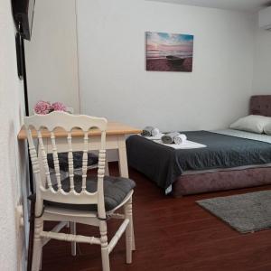 Postel nebo postele na pokoji v ubytování Apartman Tristan