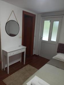 Postel nebo postele na pokoji v ubytování Apartman Tristan