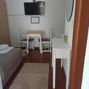TV a/nebo společenská místnost v ubytování Apartman Tristan