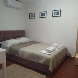 Postel nebo postele na pokoji v ubytování Apartman Tristan