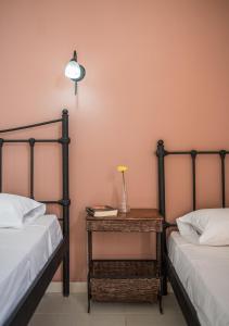 Postel nebo postele na pokoji v ubytování Hotel Rema