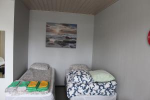 Postel nebo postele na pokoji v ubytování Flexible Myllykallio