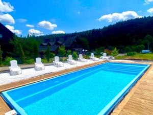 Bazén v ubytovaní Solny - Resort w Bieszczadach alebo v jeho blízkosti