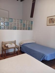 Postel nebo postele na pokoji v ubytování El Zaguan