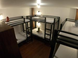 Postel nebo postele na pokoji v ubytování Bangka Hostels