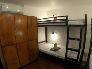 Postel nebo postele na pokoji v ubytování Bangka Hostels