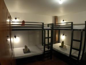 Postel nebo postele na pokoji v ubytování Bangka Hostels