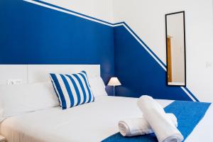 Posteľ alebo postele v izbe v ubytovaní Hotel Náutico Santander
