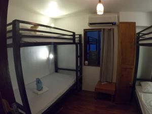 Postel nebo postele na pokoji v ubytování Bangka Hostels