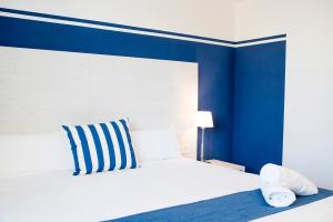 Posteľ alebo postele v izbe v ubytovaní Hotel Náutico Santander