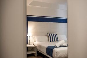 Posteľ alebo postele v izbe v ubytovaní Hotel Náutico Santander