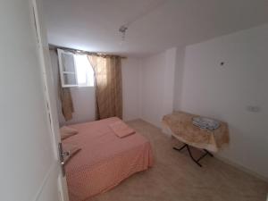 En eller flere senge i et værelse på Dar Rayen + 2 billeder