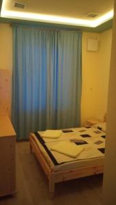 Ένα ή περισσότερα κρεβάτια σε δωμάτιο στο Luxury Studio Neptune Center