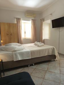 Φωτογραφία από το άλμπουμ του Feidiou 1, vol I στην Αίγινα Πόλη