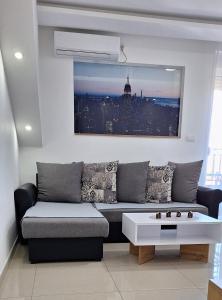Posezení v ubytování S-Apartmani Cocetova