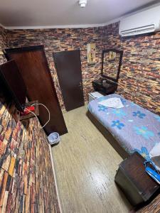 Voodi või voodid majutusasutuse Cairo hotel toas
