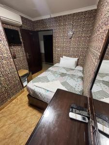 Voodi või voodid majutusasutuse Cairo hotel toas
