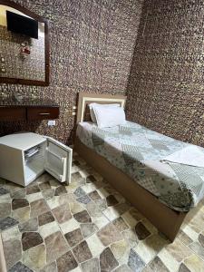 Voodi või voodid majutusasutuse Cairo hotel toas