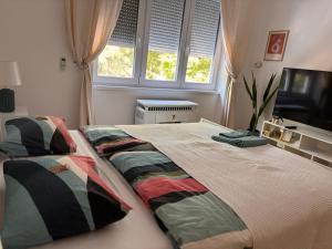 Katil atau katil-katil dalam bilik di The Park Suite Győr