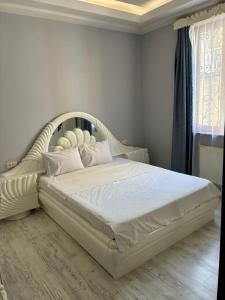 Postel nebo postele na pokoji v ubytování K17 mini hotel