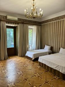 Postel nebo postele na pokoji v ubytování K17 mini hotel