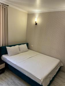 Postel nebo postele na pokoji v ubytování K17 mini hotel