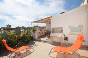 Un patio o zona al aire libre en Sea&Sun Apartments