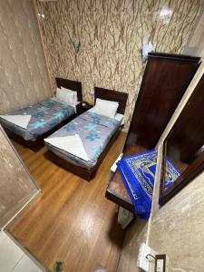 Voodi või voodid majutusasutuse Cairo hotel toas