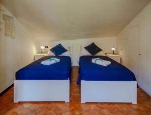 A bed or beds in a room at El Nin Apartment with Terrace