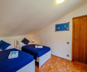 A bed or beds in a room at El Nin Apartment with Terrace