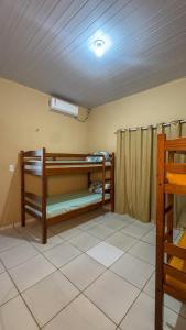 a room with bunk beds in a room at Pousada e Hostel Refúgio dos Lençóis in Barreirinhas +28 photos