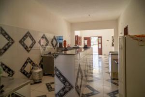 Kuchyň nebo kuchyňský kout v ubytování Casa de praia, praia do Prea