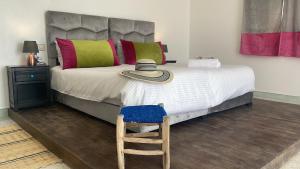 Ένα ή περισσότερα κρεβάτια σε δωμάτιο στο Villa M'Birika Maison d'hôtes