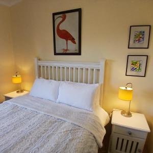 Postel nebo postele na pokoji v ubytování Paulet Cottage
