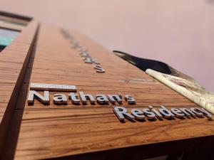Certifikát, hodnocení, plakát nebo jiný dokument vystavený v ubytování Nathan's Residency
