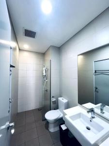 a bathroom with a toilet and a sink at Dino Homes at i-City - WiFi TV Box 1 Carpark in Shah Alam +11 photos