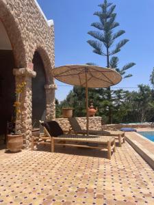 Πισίνα στο ή κοντά στο Villa M'Birika Maison d'hôtes