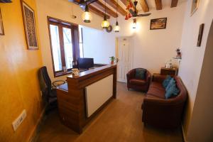 Posezení v ubytování Le Clarisse Guest House