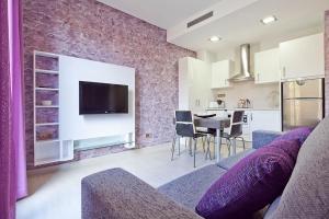 Kuchyň nebo kuchyňský kout v ubytování Aparthotel Rambla108