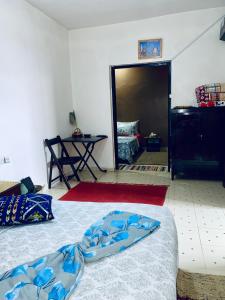 Postel nebo postele na pokoji v ubytování Calm appartment close to airport of Marrakech