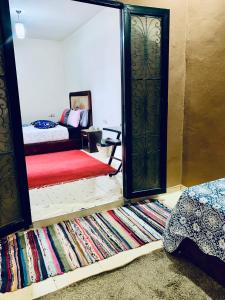 Postel nebo postele na pokoji v ubytování Calm appartment close to airport of Marrakech