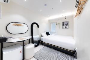 Slowon Hostel 슬로우온 호스텔 홍대 객실 침대