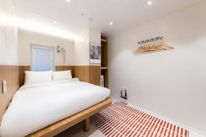 Slowon Hostel 슬로우온 호스텔 홍대 객실 침대